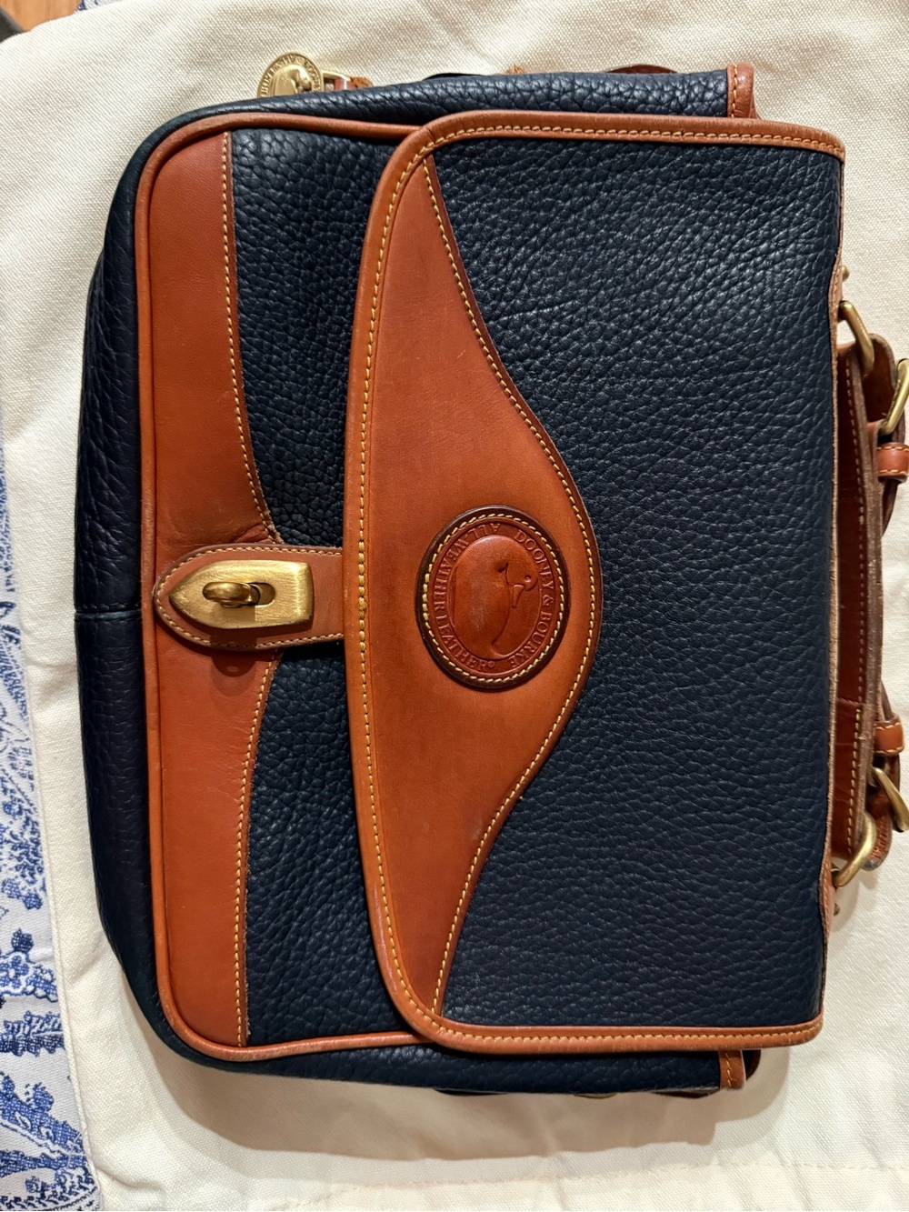 Dooney & Bourke Navy and Brown Pebbled Leather Briefcase
